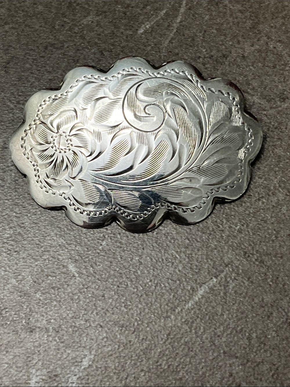 Vtg Sterling marked engraved silver floral brooch. 1”x2”